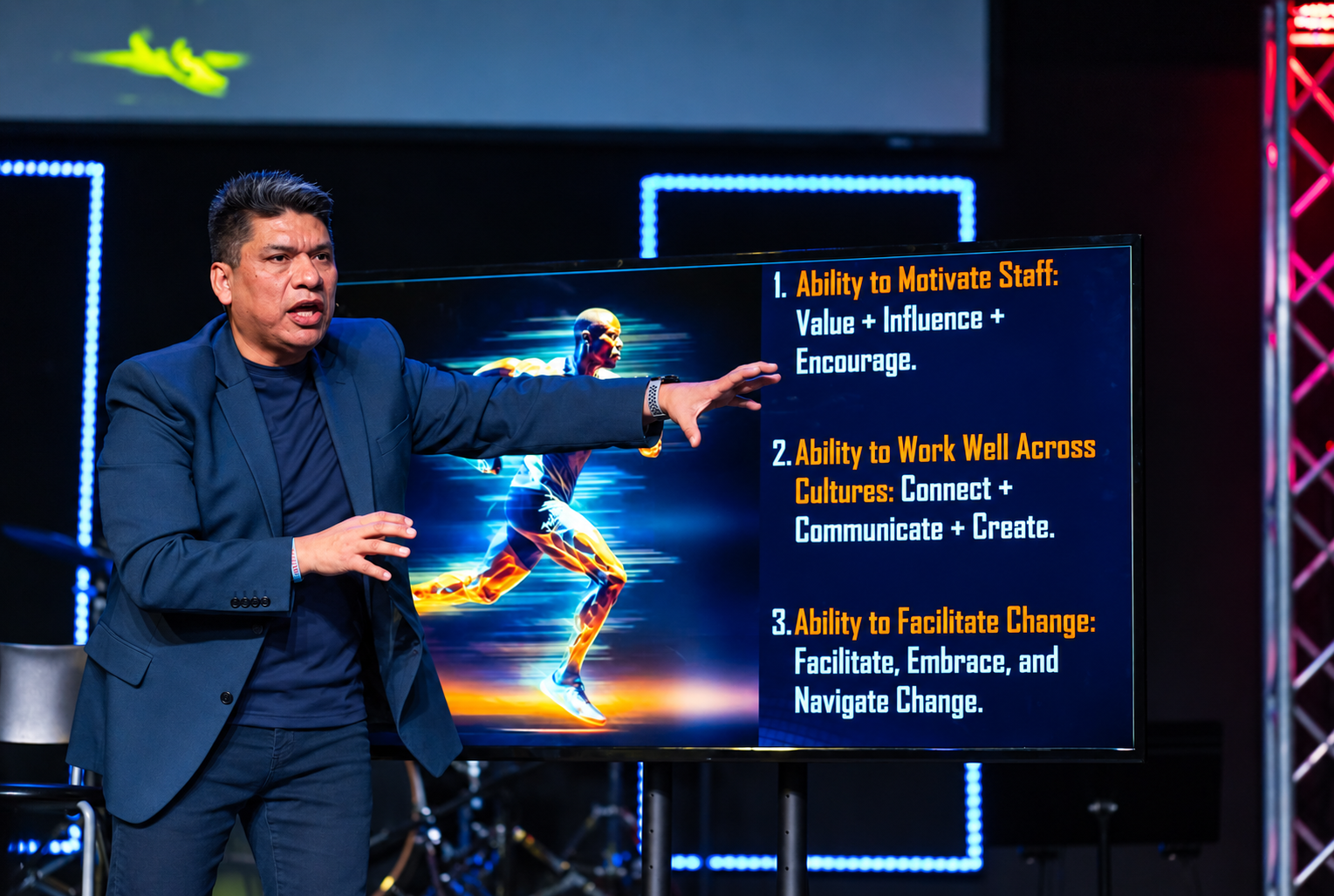 Heber Mena presenting onstage at Live2Lead